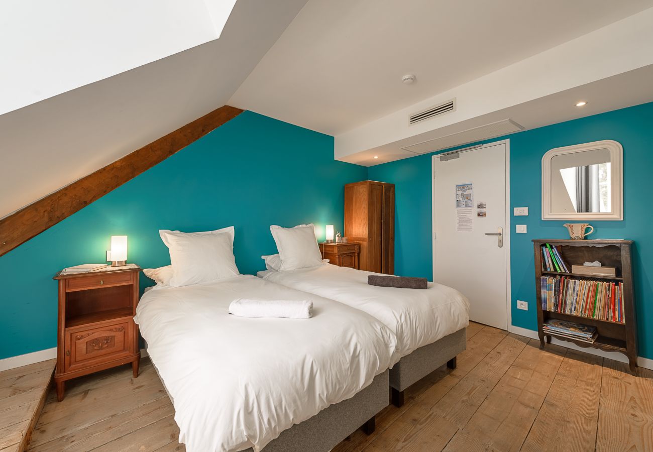 Bedroom in a luxury estate on Lake Annecy with a view