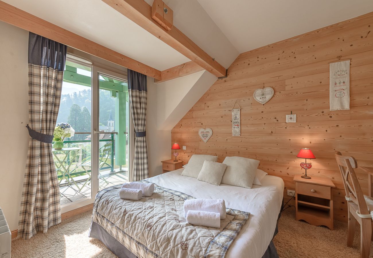 Master bedroom with access to balcony and office area 